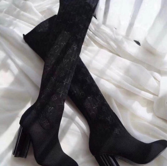 Photo of LV Thigh High Boots